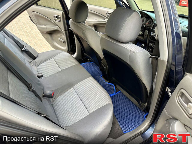 Синій Ніссан Альмера, об'ємом двигуна 1.6 л та пробігом 136 тис. км за 5999 $, фото 9 на Automoto.ua