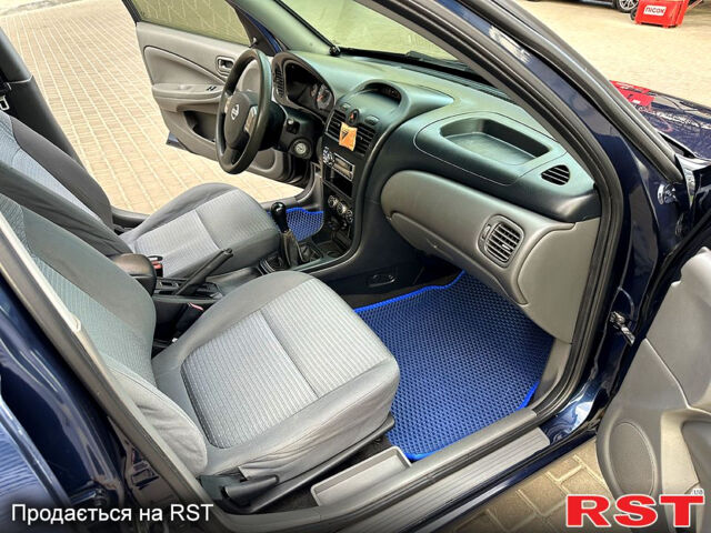 Синій Ніссан Альмера, об'ємом двигуна 1.6 л та пробігом 136 тис. км за 5999 $, фото 10 на Automoto.ua