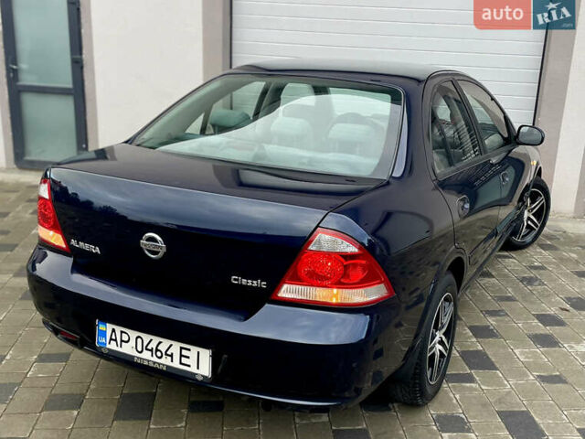 Синій Ніссан Альмера, об'ємом двигуна 1.6 л та пробігом 254 тис. км за 6650 $, фото 24 на Automoto.ua