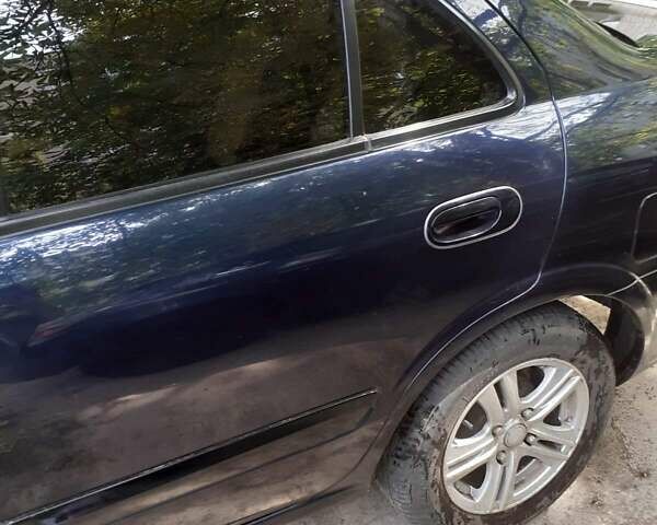 Синий Ниссан Альмера, объемом двигателя 1.6 л и пробегом 110 тыс. км за 6100 $, фото 17 на Automoto.ua
