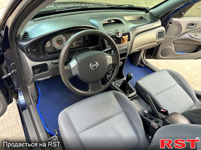 Синій Ніссан Альмера, об'ємом двигуна 1.6 л та пробігом 136 тис. км за 5999 $, фото 11 на Automoto.ua