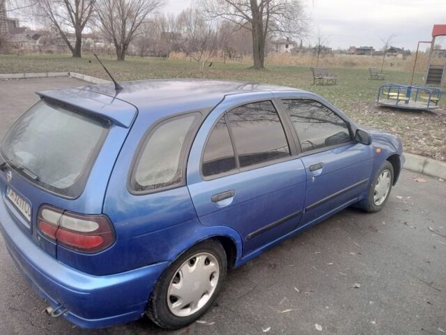 Синий Ниссан Альмера, объемом двигателя 1.4 л и пробегом 323 тыс. км за 1800 $, фото 5 на Automoto.ua