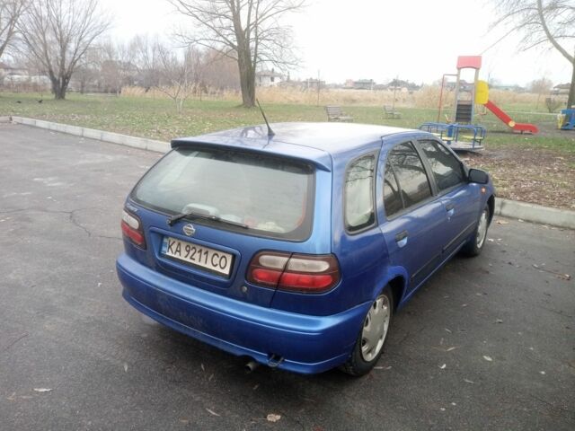 Синий Ниссан Альмера, объемом двигателя 1.4 л и пробегом 323 тыс. км за 1800 $, фото 4 на Automoto.ua