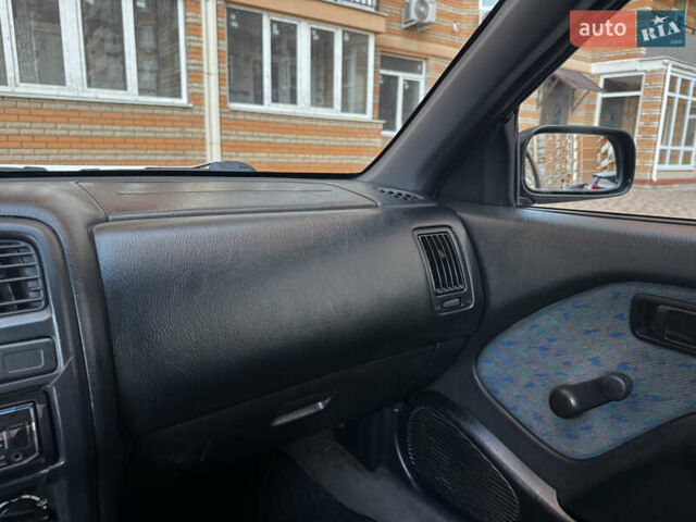 Зеленый Ниссан Альмера, объемом двигателя 1.39 л и пробегом 227 тыс. км за 1900 $, фото 21 на Automoto.ua