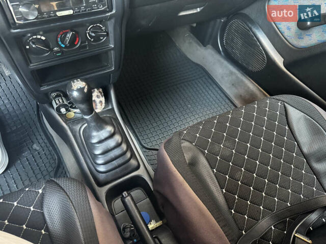 Зеленый Ниссан Альмера, объемом двигателя 1.39 л и пробегом 227 тыс. км за 1900 $, фото 22 на Automoto.ua