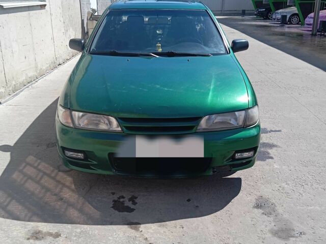 Зелений Ніссан Альмера, об'ємом двигуна 1.4 л та пробігом 360 тис. км за 1800 $, фото 1 на Automoto.ua