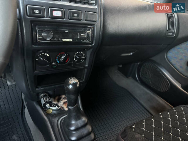 Зеленый Ниссан Альмера, объемом двигателя 1.39 л и пробегом 227 тыс. км за 1900 $, фото 23 на Automoto.ua