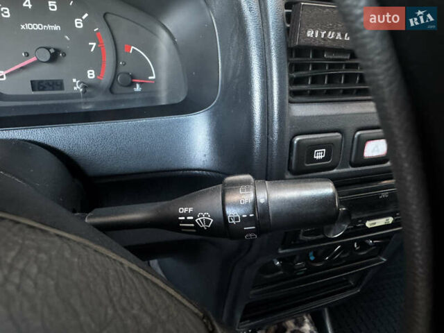 Зеленый Ниссан Альмера, объемом двигателя 1.39 л и пробегом 227 тыс. км за 1900 $, фото 24 на Automoto.ua