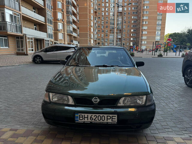 Зеленый Ниссан Альмера, объемом двигателя 1.39 л и пробегом 227 тыс. км за 1900 $, фото 6 на Automoto.ua