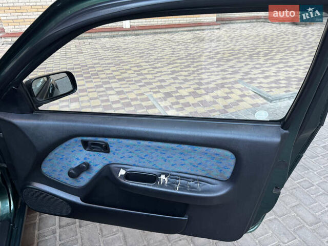 Зеленый Ниссан Альмера, объемом двигателя 1.39 л и пробегом 227 тыс. км за 1900 $, фото 13 на Automoto.ua