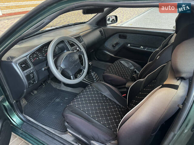 Зеленый Ниссан Альмера, объемом двигателя 1.39 л и пробегом 227 тыс. км за 1900 $, фото 16 на Automoto.ua