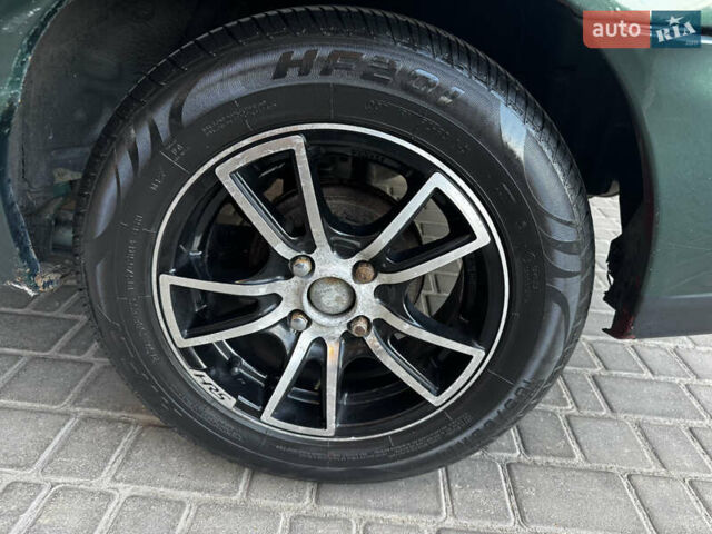 Зеленый Ниссан Альмера, объемом двигателя 1.39 л и пробегом 227 тыс. км за 1900 $, фото 26 на Automoto.ua