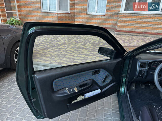 Зеленый Ниссан Альмера, объемом двигателя 1.39 л и пробегом 227 тыс. км за 1900 $, фото 17 на Automoto.ua