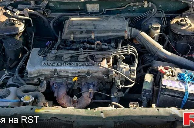 Зелений Ніссан Альмера, об'ємом двигуна 1.4 л та пробігом 450 тис. км за 1200 $, фото 6 на Automoto.ua