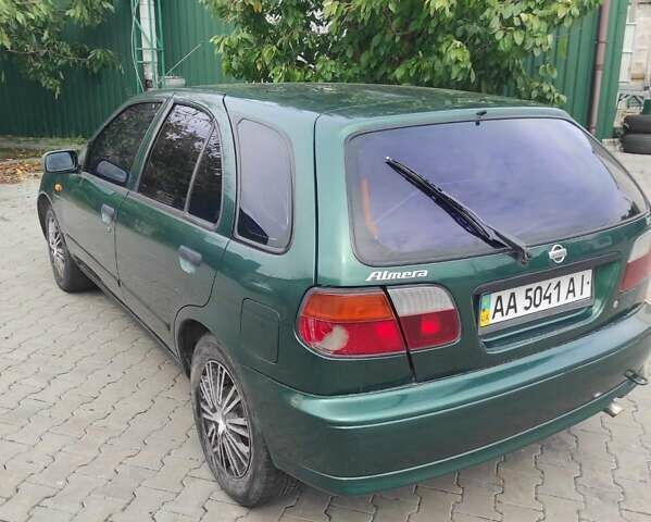 Зеленый Ниссан Альмера, объемом двигателя 1.4 л и пробегом 240 тыс. км за 1350 $, фото 2 на Automoto.ua