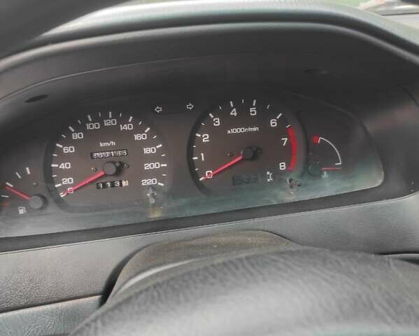 Зеленый Ниссан Альмера, объемом двигателя 1.4 л и пробегом 240 тыс. км за 1350 $, фото 8 на Automoto.ua