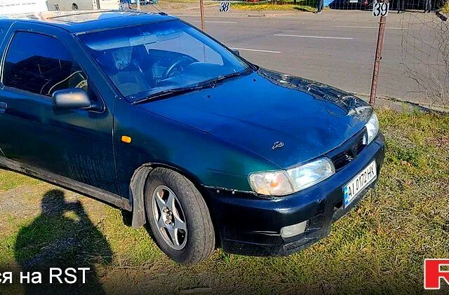 Зелений Ніссан Альмера, об'ємом двигуна 1.4 л та пробігом 450 тис. км за 1200 $, фото 4 на Automoto.ua