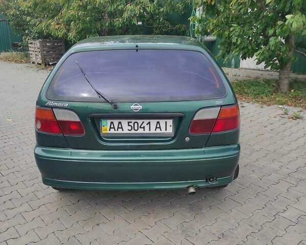 Зеленый Ниссан Альмера, объемом двигателя 1.4 л и пробегом 240 тыс. км за 1350 $, фото 12 на Automoto.ua