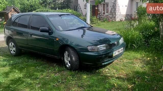 Зеленый Ниссан Альмера, объемом двигателя 1.4 л и пробегом 250 тыс. км за 1600 $, фото 4 на Automoto.ua