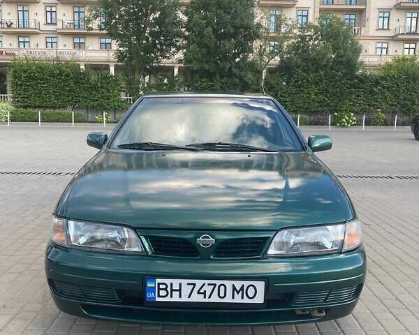 Зелений Ніссан Альмера, об'ємом двигуна 1.4 л та пробігом 275 тис. км за 4000 $, фото 10 на Automoto.ua