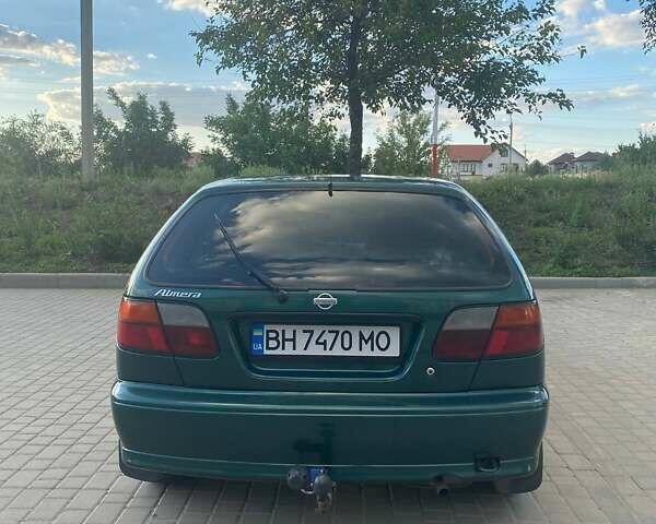 Зелений Ніссан Альмера, об'ємом двигуна 1.4 л та пробігом 275 тис. км за 4000 $, фото 9 на Automoto.ua