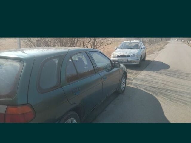 Зеленый Ниссан Альмера, объемом двигателя 1.4 л и пробегом 200 тыс. км за 971 $, фото 1 на Automoto.ua