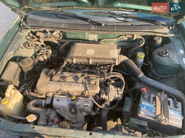 Зелений Ніссан Альмера, об'ємом двигуна 1.4 л та пробігом 275 тис. км за 4000 $, фото 4 на Automoto.ua