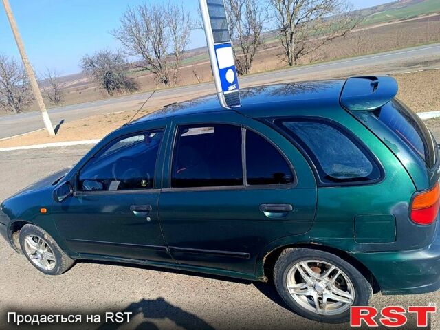 Зелений Ніссан Альмера, об'ємом двигуна 1.4 л та пробігом 400 тис. км за 2200 $, фото 7 на Automoto.ua