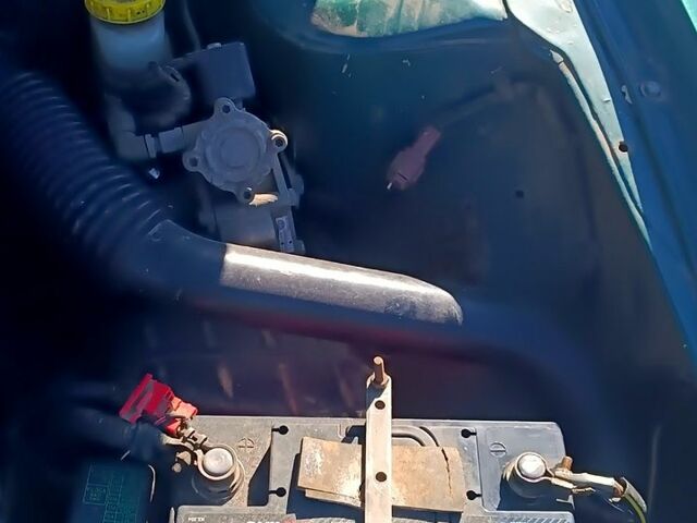 Зелений Ніссан Альмера, об'ємом двигуна 1.4 л та пробігом 400 тис. км за 2200 $, фото 6 на Automoto.ua