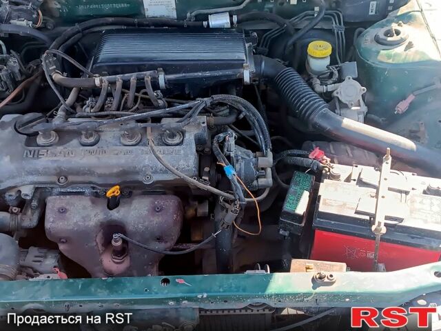 Зелений Ніссан Альмера, об'ємом двигуна 1.4 л та пробігом 400 тис. км за 2200 $, фото 9 на Automoto.ua