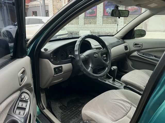 Зеленый Ниссан Альмера, объемом двигателя 1.8 л и пробегом 245 тыс. км за 3999 $, фото 9 на Automoto.ua