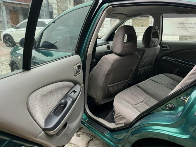 Зеленый Ниссан Альмера, объемом двигателя 1.8 л и пробегом 245 тыс. км за 3999 $, фото 17 на Automoto.ua