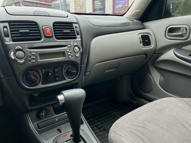 Зеленый Ниссан Альмера, объемом двигателя 1.8 л и пробегом 245 тыс. км за 3999 $, фото 14 на Automoto.ua