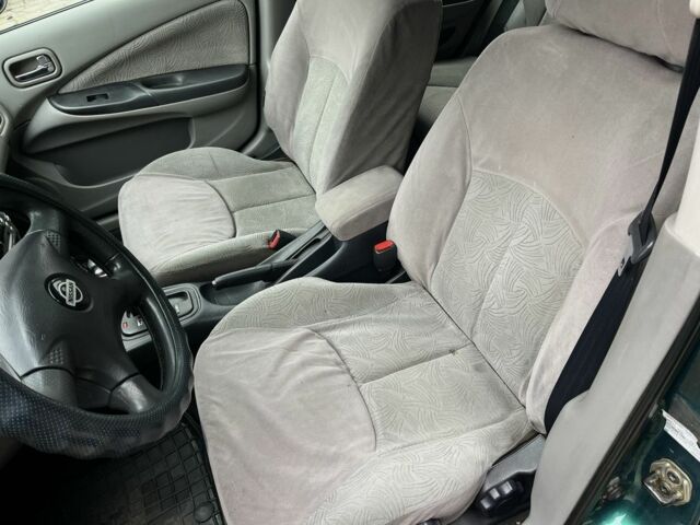 Зеленый Ниссан Альмера, объемом двигателя 1.8 л и пробегом 245 тыс. км за 3999 $, фото 13 на Automoto.ua