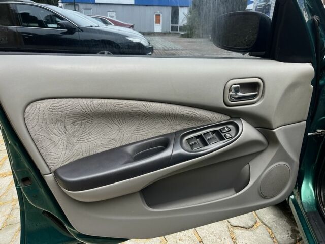 Зеленый Ниссан Альмера, объемом двигателя 1.8 л и пробегом 245 тыс. км за 3999 $, фото 10 на Automoto.ua