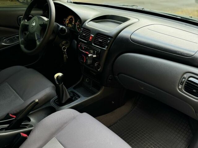 Зеленый Ниссан Альмера, объемом двигателя 1.5 л и пробегом 275 тыс. км за 3350 $, фото 8 на Automoto.ua