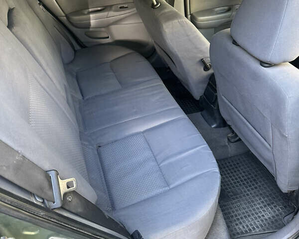 Зеленый Ниссан Альмера, объемом двигателя 1.46 л и пробегом 369 тыс. км за 3000 $, фото 6 на Automoto.ua