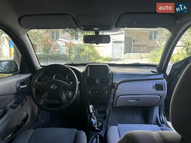 Зеленый Ниссан Альмера, объемом двигателя 1.46 л и пробегом 369 тыс. км за 3000 $, фото 5 на Automoto.ua