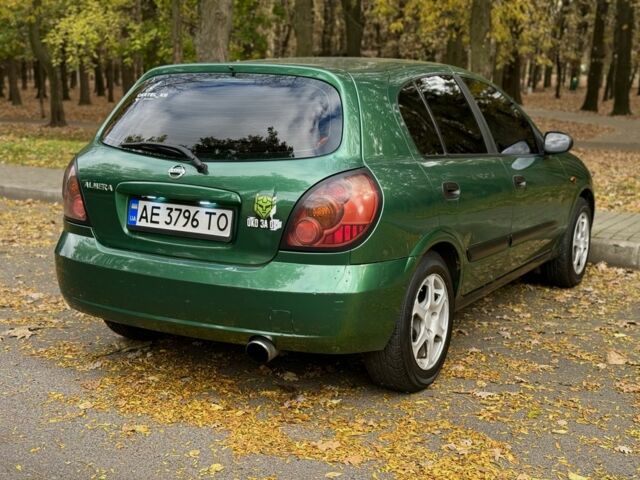 Зеленый Ниссан Альмера, объемом двигателя 1.5 л и пробегом 275 тыс. км за 3350 $, фото 4 на Automoto.ua