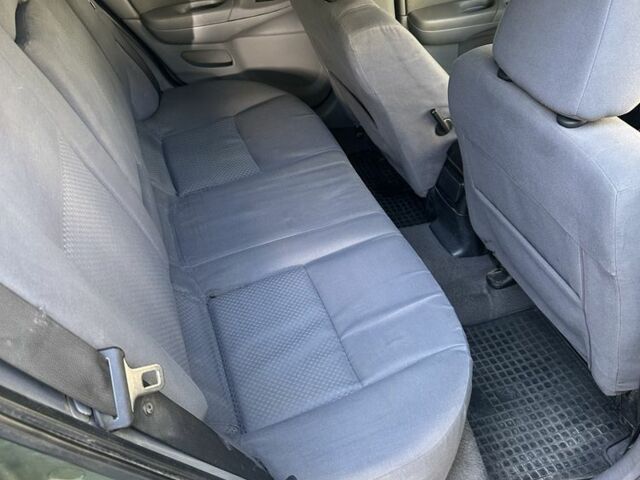 Зеленый Ниссан Альмера, объемом двигателя 1.5 л и пробегом 369 тыс. км за 3500 $, фото 6 на Automoto.ua