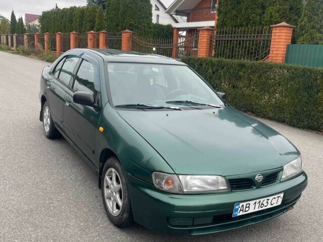Зеленый Ниссан Альмера, объемом двигателя 1.4 л и пробегом 234 тыс. км за 1900 $, фото 7 на Automoto.ua