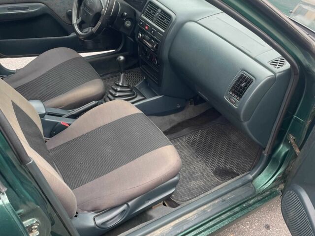 Зеленый Ниссан Альмера, объемом двигателя 1.4 л и пробегом 234 тыс. км за 1900 $, фото 15 на Automoto.ua