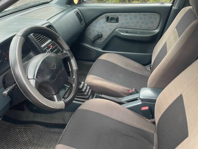 Зеленый Ниссан Альмера, объемом двигателя 1.4 л и пробегом 234 тыс. км за 1900 $, фото 9 на Automoto.ua