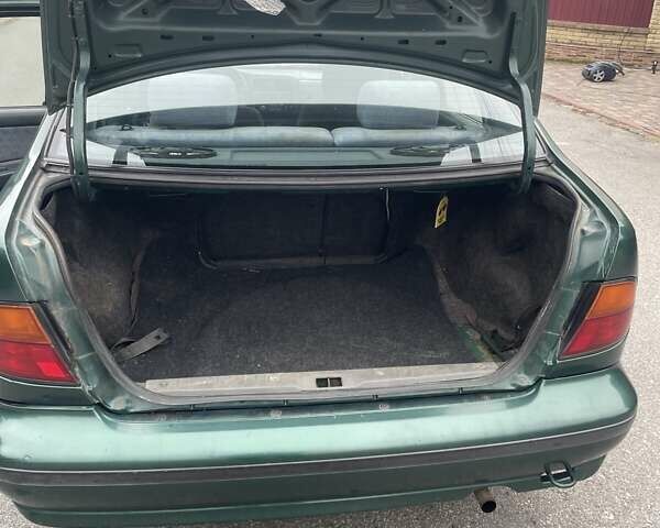 Зеленый Ниссан Альмера, объемом двигателя 1.39 л и пробегом 234 тыс. км за 1900 $, фото 14 на Automoto.ua