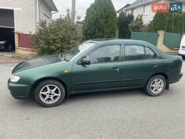 Зеленый Ниссан Альмера, объемом двигателя 1.39 л и пробегом 234 тыс. км за 1900 $, фото 1 на Automoto.ua