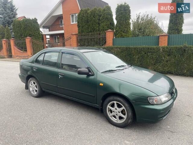 Зеленый Ниссан Альмера, объемом двигателя 1.39 л и пробегом 234 тыс. км за 1900 $, фото 6 на Automoto.ua