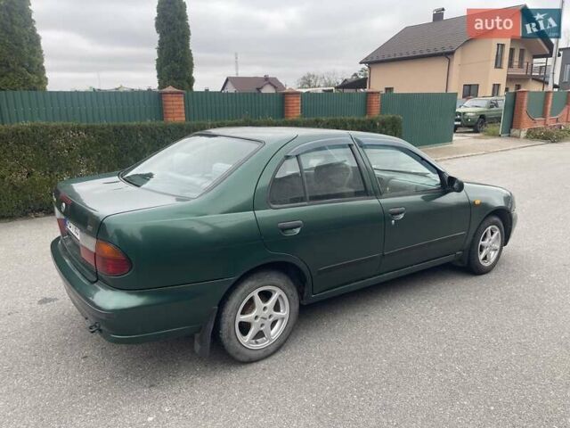 Зеленый Ниссан Альмера, объемом двигателя 1.39 л и пробегом 234 тыс. км за 1900 $, фото 5 на Automoto.ua