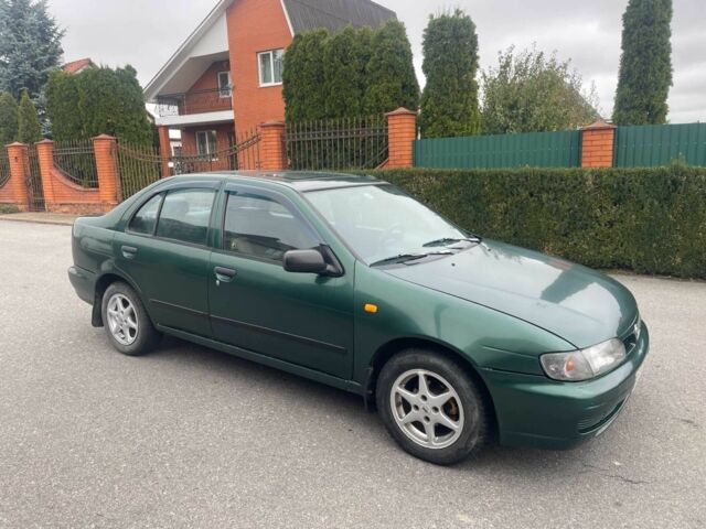 Зеленый Ниссан Альмера, объемом двигателя 1.4 л и пробегом 234 тыс. км за 1900 $, фото 6 на Automoto.ua