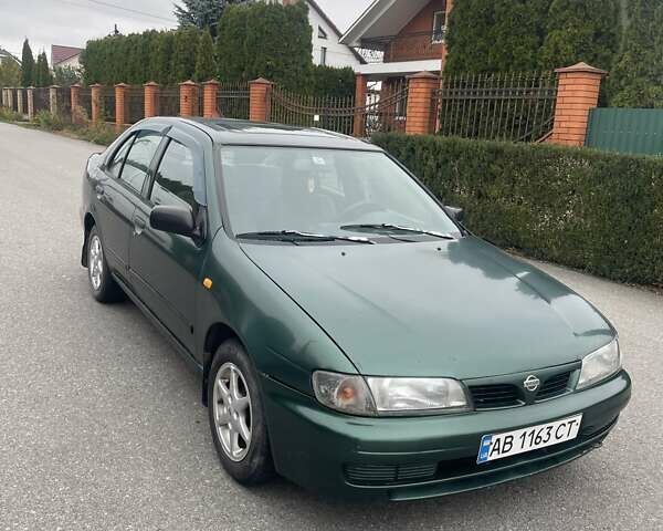Зеленый Ниссан Альмера, объемом двигателя 1.39 л и пробегом 234 тыс. км за 1900 $, фото 7 на Automoto.ua