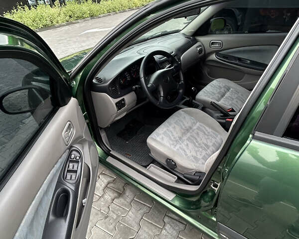 Зелений Ніссан Альмера, об'ємом двигуна 1.5 л та пробігом 276 тис. км за 3700 $, фото 7 на Automoto.ua